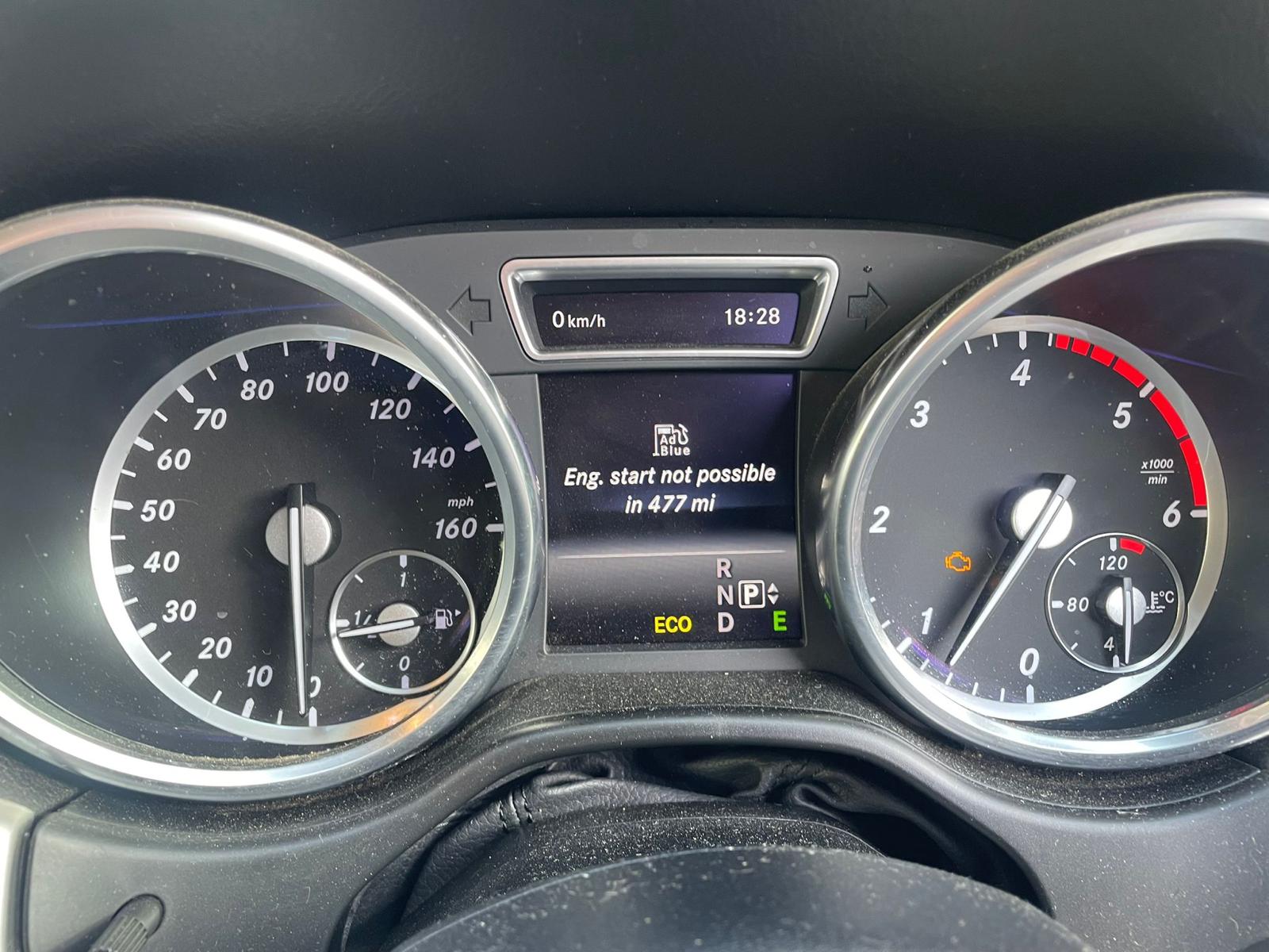 Mercedes-Benz dashboard showing AdBlue warning: “Eng. start not possible in 477 mi”
