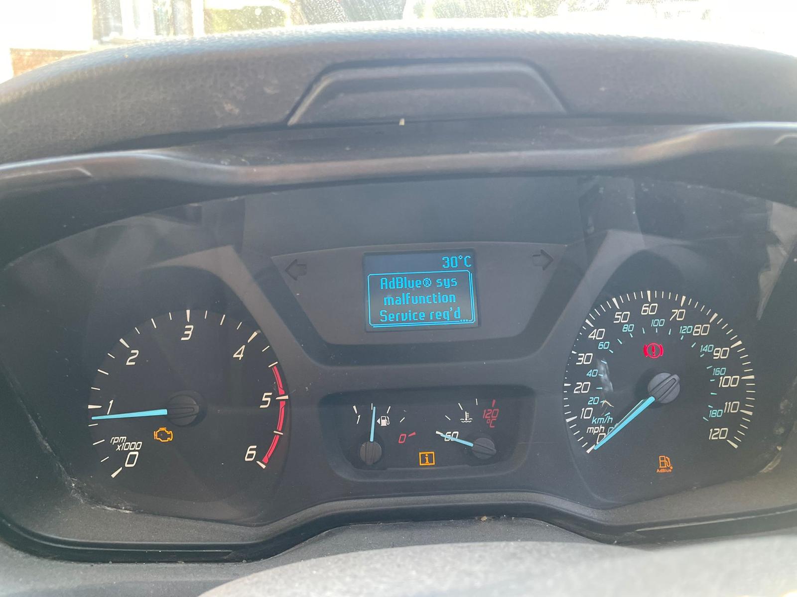 Ford Transit dashboard showing AdBlue warning: “AdBlue® sys malfunction. Service req'd”