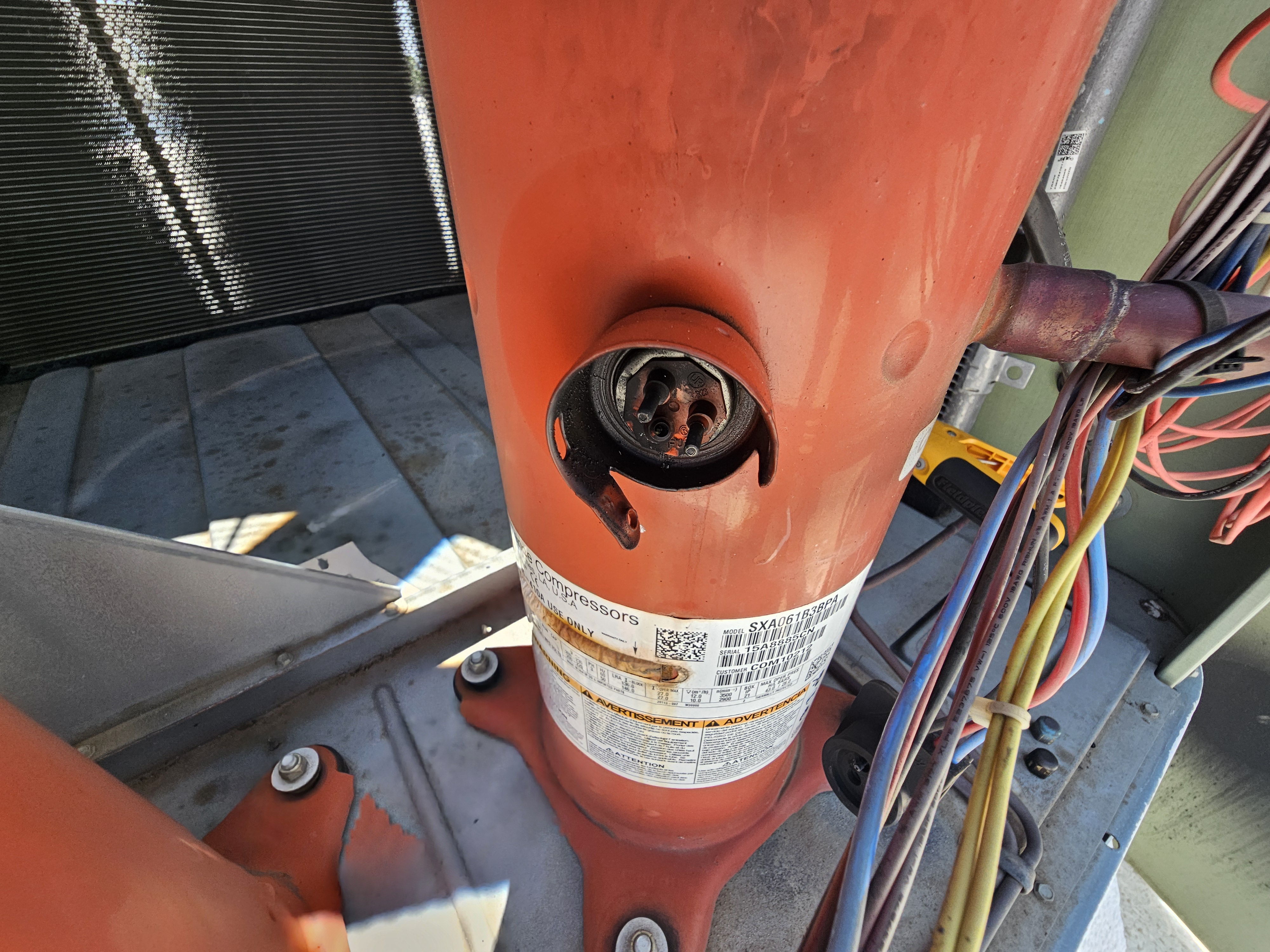 Failed HVAC compressor with burned terminals