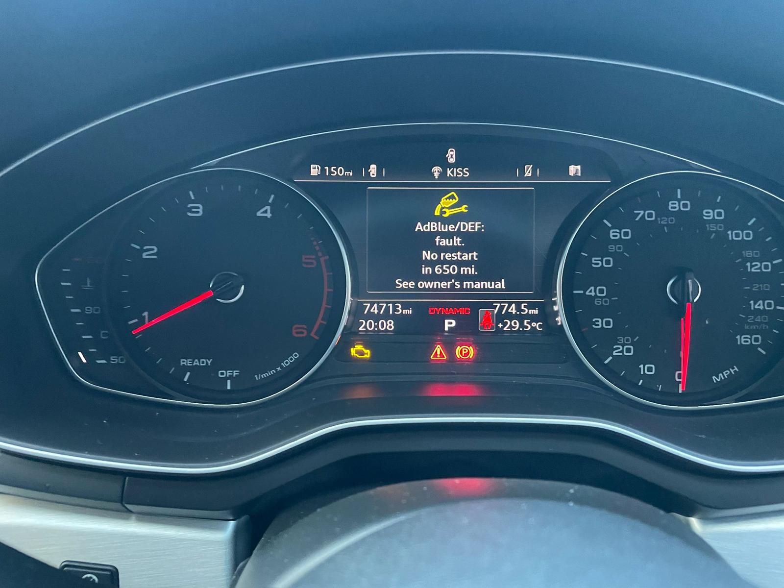 Audi (virtual cockpit) dashboard showing AdBlue warning: “AdBlue/DEF: fault. No restart in 650 mi. See owner's manual”