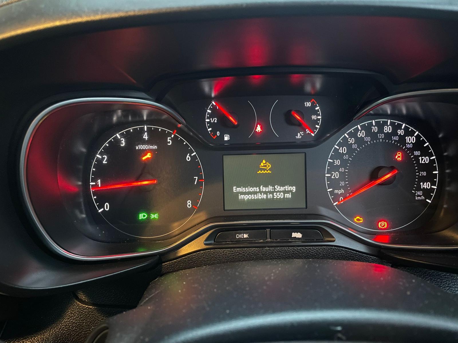 Vauxhall Combo Van dashboard showing AdBlue warning: “Emissions fault: Starting impossible in 550 mi”