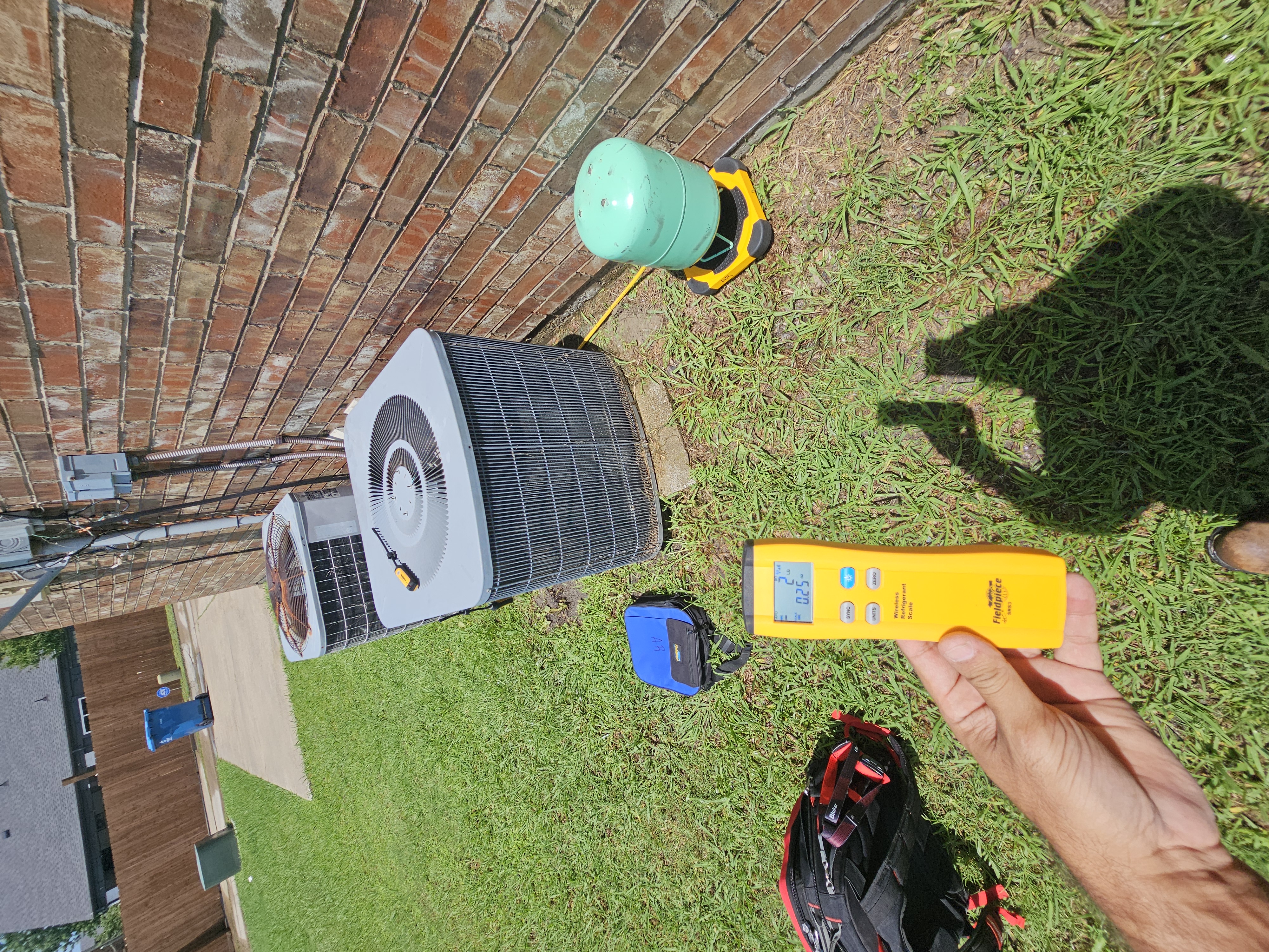 Fieldpiece refrigerant scale while recharging a residential AC system