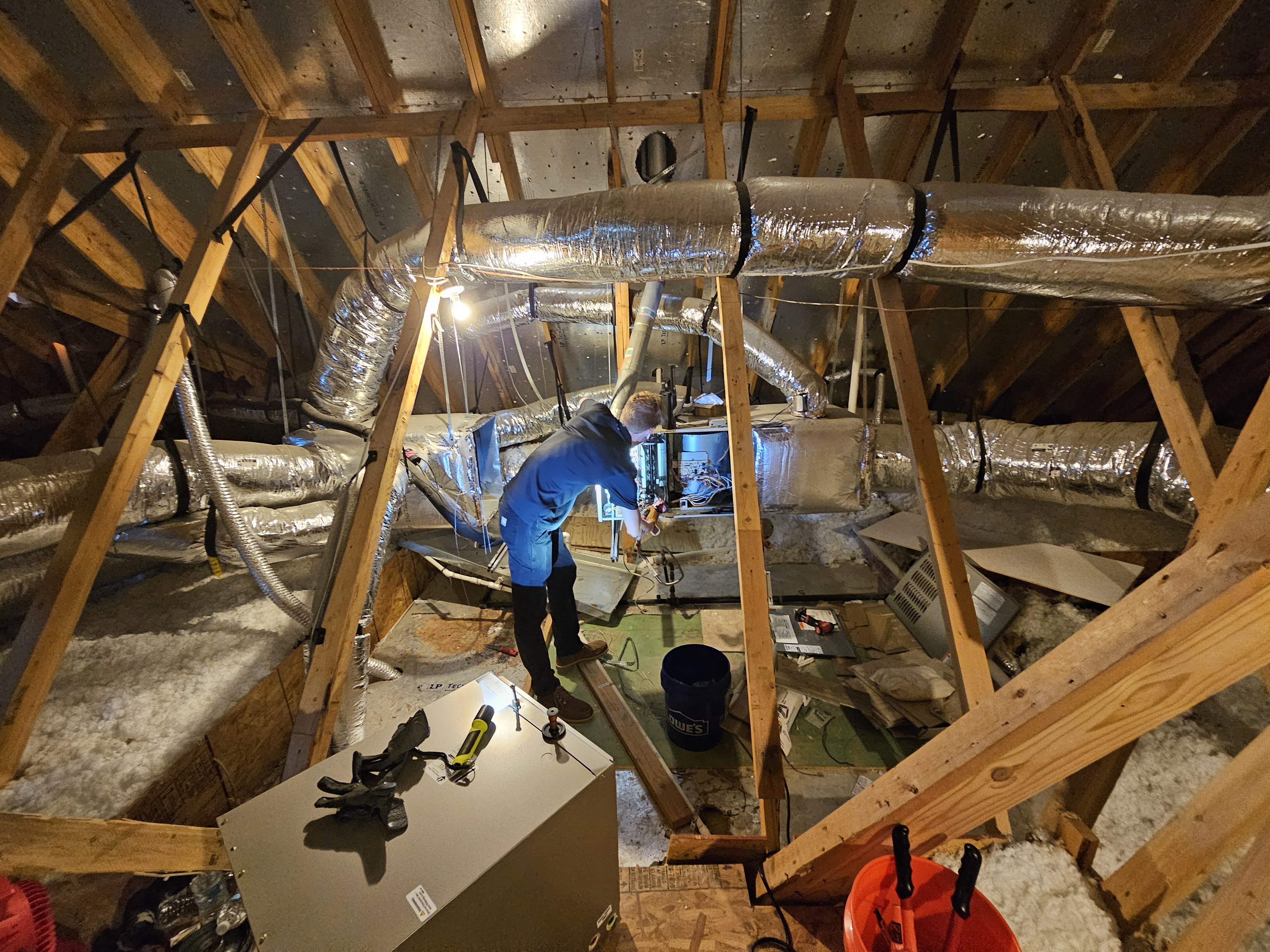 Technician in attic